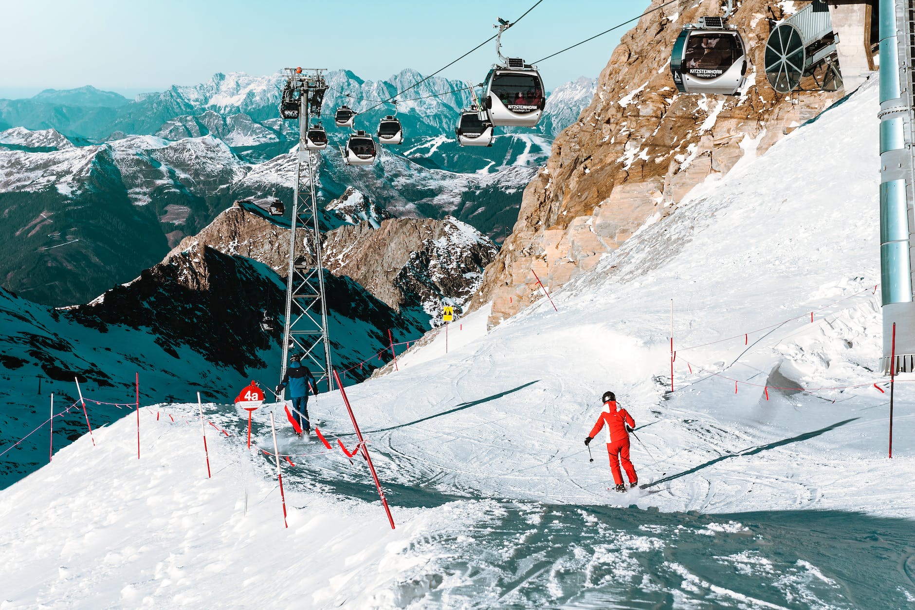 high angle view of people skiing on snowcapped mountain